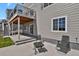 Back patio featuring a fire pit, ideal for relaxing and entertaining at 5166 Trails Edge Ln, Castle Rock, CO 80104
