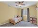 Bedroom with plush carpet, natural light, ceiling fan, and cozy decor at 5166 Trails Edge Ln, Castle Rock, CO 80104