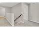 Upstairs hallway with carpet and access to rooms at 5166 Trails Edge Ln, Castle Rock, CO 80104