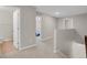 Carpeted upstairs hallway with access to bathroom and bedroom at 5166 Trails Edge Ln, Castle Rock, CO 80104