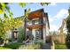 Contemporary home featuring two stories, a private balcony, and modern architectural design at 3617 Shoshone St, Denver, CO 80211
