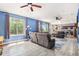 Spacious living room with ample natural light and views of the outdoors at 9530 E 113Th Ave, Commerce City, CO 80640
