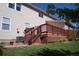 The back of the house shows a wooden deck accessible from the yard, offering outdoor living at 10966 Josephine St, Northglenn, CO 80233