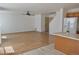 Spacious living room featuring new vinyl flooring and an open floor plan at 10966 Josephine St, Northglenn, CO 80233