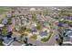 An aerial view of the neighborhood showcasing the houses and green spaces surrounding the community at 9525 W Victoria Dr, Littleton, CO 80128