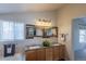Bathroom with a double vanity, decorative mirrors, and an undermount sink at 9525 W Victoria Dr, Littleton, CO 80128