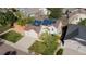 Beautiful home with solar panels, attached two car garage, and a well-manicured lawn at 9525 W Victoria Dr, Littleton, CO 80128