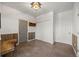 This functional mud room features a tiled floor, storage cubbies, closet and ample space to welcome guests at 12672 Rancho Ct, Conifer, CO 80433