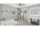 Bedroom featuring neutral walls, carpet, and desk area near windows at 11367 S Blackthorn Ct, Parker, CO 80134