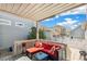 Inviting covered patio with comfortable seating, perfect for outdoor relaxation and entertainment at 11367 S Blackthorn Ct, Parker, CO 80134
