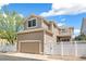 Charming two-story home featuring a fenced yard and attached garage, perfect for suburban living at 11367 S Blackthorn Ct, Parker, CO 80134