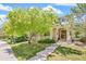Lovely home exterior with well-maintained lawn and front porch, offering curb appeal and charm at 11367 S Blackthorn Ct, Parker, CO 80134