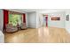 Elegant living room with hardwood floors, large windows, and stylish seating at 11367 S Blackthorn Ct, Parker, CO 80134
