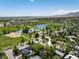 Aerial view of a home near a scenic lake, park, and school, highlighting its ideal location for families at 1270 Berea Dr, Boulder, CO 80305