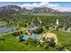 Aerial view of a home with a scenic lake, park, and school nearby, showcasing its desirable and convenient location at 1270 Berea Dr, Boulder, CO 80305