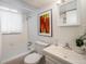 Clean bathroom with a shower-tub combo and updated fixtures at 1270 Berea Dr, Boulder, CO 80305