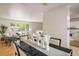 Elegant dining room with stylish table setting and view into the living room at 1270 Berea Dr, Boulder, CO 80305