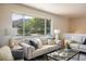 Inviting living room featuring stylish seating and a large window with mountain views at 1270 Berea Dr, Boulder, CO 80305