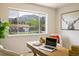 Cozy office featuring natural light, mountain views, wooden desk and an animal painting at 1270 Berea Dr, Boulder, CO 80305