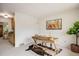 Bright office space with a wooden desk, area rug and views into the kitchen at 1270 Berea Dr, Boulder, CO 80305