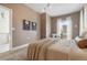 Serene bedroom with neutral tones, window, and stylish decor offering a calming retreat at 2530 Lawrence St # Ra101, Denver, CO 80205