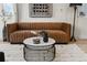 Close up of stylish living room with modern furniture, neutral colors, and unique decor at 2530 Lawrence St # Ra101, Denver, CO 80205