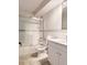 A bathroom with a shower/tub combo and vanity at 6960 E Girard Ave # 404, Denver, CO 80224