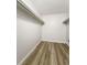 A walk in closet with shelving at 6960 E Girard Ave # 404, Denver, CO 80224