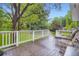 Outdoor deck featuring plenty of space and views of the backyard at 1715 Alkire St, Golden, CO 80401