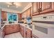 Well-lit kitchen with wooden cabinets and modern appliances at 1715 Alkire St, Golden, CO 80401