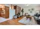 Cozy living room featuring hardwood floors, fireplace, and stylish decor at 1715 Alkire St, Golden, CO 80401