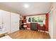 Comfortable bedroom with hardwood floors, bright window, and plenty of storage space to create cozy retreat at 6480 W 60Th Ave, Arvada, CO 80003