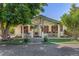 Inviting front porch with vibrant shutters, decorative plants, and ample space for seating at 6480 W 60Th Ave, Arvada, CO 80003