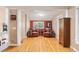 Cozy living room with hardwood floors, natural light, and comfortable seating creating a relaxing atmosphere at 6480 W 60Th Ave, Arvada, CO 80003