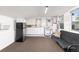 Living space features full kitchen, seating and window views at 6480 W 60Th Ave, Arvada, CO 80003