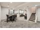 Finished basement with media area and ample seating, perfect for entertainment at 16564 High Desert Way, Parker, CO 80134