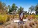 Picturesque park showcasing a gazebo and modern art installation, creating a serene and inviting atmosphere at 16564 High Desert Way, Parker, CO 80134