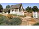 Community historic park with white picket fence and walking path at 16564 High Desert Way, Parker, CO 80134