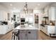 Modern kitchen featuring custom cabinets, granite counters, and stainless steel appliances at 2495 S Madison St, Denver, CO 80210