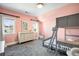 Charming bedroom featuring a bunk bed, dresser, and ample light from multiple windows at 2495 S Madison St, Denver, CO 80210