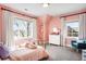 Charming bedroom with whimsical decor, natural light, and a comfortable design at 2495 S Madison St, Denver, CO 80210