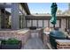 Backyard with outdoor kitchen and large green egg grill for entertaining and cooking at 2495 S Madison St, Denver, CO 80210