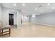 Spacious finished basement with recessed lighting, light walls, and hardwood floors at 4860 S Field Way, Littleton, CO 80123
