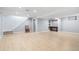 Finished basement with hardwood floors, recessed lighting, and storage space at 4860 S Field Way, Littleton, CO 80123