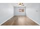 Bright bedroom with hardwood floors and a view to the outdoors at 4860 S Field Way, Littleton, CO 80123