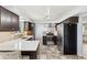 Modern kitchen featuring stainless steel appliances and quartz countertops at 4860 S Field Way, Littleton, CO 80123