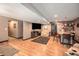 Spacious basement with a wet bar, television, and comfortable seating area at 6021 Lynx Creek Cir, Erie, CO 80516