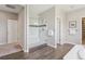 Modern bathroom featuring walk in shower, and tile flooring at 3890 Tabor Ct, Wheat Ridge, CO 80033