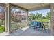 Relaxing covered front porch with comfortable seating, ideal for enjoying the outdoors at 3890 Tabor Ct, Wheat Ridge, CO 80033