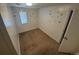 View of cozy bedroom featuring neutral paint, carpet, and window at 444 S Jersey St, Denver, CO 80224